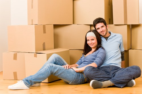 Professional movers handling household items