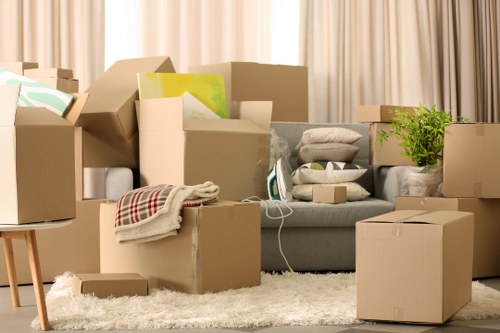 Professional movers handling heavy office furniture